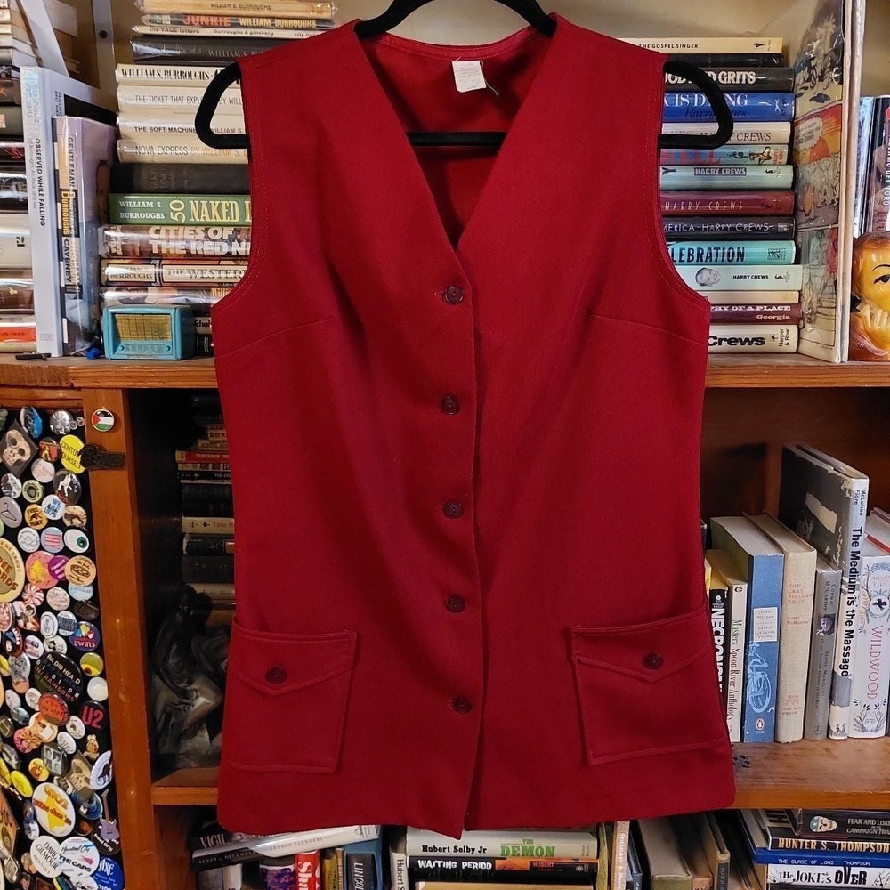 Vintage red long vest with front pockets.